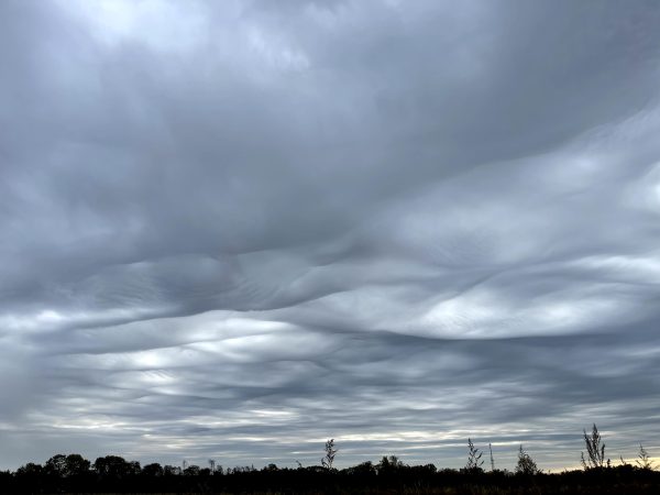 Asperitas clouds forming dramatic wave-like patterns over Irons Fruit Farm in Lebanon, Ohio